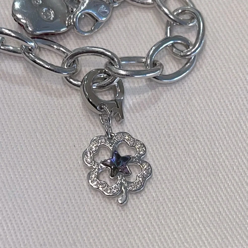 Swarovski Silver Four-Leaf Clover Charm Bracelet with Blue Crystal Accent
